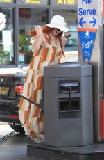 PHOEBE PRICE Digs in the Garbage at a Gas Station in Beverly Hills 06/22/2018
