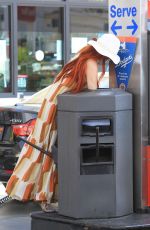 PHOEBE PRICE Digs in the Garbage at a Gas Station in Beverly Hills 06/22/2018