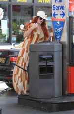 PHOEBE PRICE Digs in the Garbage at a Gas Station in Beverly Hills 06/22/2018