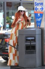 PHOEBE PRICE Digs in the Garbage at a Gas Station in Beverly Hills 06/22/2018