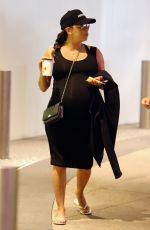 Pregnant EVA LONGORIA Arrives at Macy