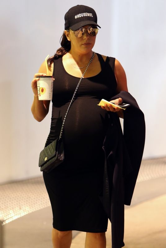 Pregnant EVA LONGORIA Arrives at Macy