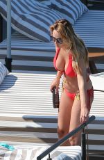 RHIAN SUDGEN in Bikini at a Pool in Ibiza 06/14/2018