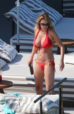 RHIAN SUDGEN in Bikini at a Pool in Ibiza 06/14/2018