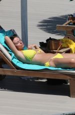 RHIAN SUDGEN in Bikini at a Pool in Ibiza 06/17/2018