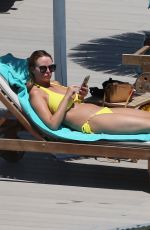 RHIAN SUDGEN in Bikini at a Pool in Ibiza 06/17/2018