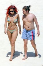RITA ORA in Bikini at a Beach in Tuscany 06/06/2018
