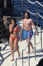 RITA ORA in Red Bikini at a Beach in Tuscany 06/05/2018