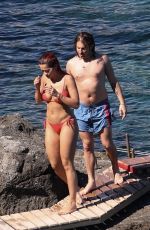 RITA ORA in Red Bikini at a Beach in Tuscany 06/05/2018
