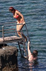 RITA ORA in Red Bikini at a Beach in Tuscany 06/05/2018