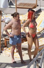RITA ORA in Red Bikini at a Beach in Tuscany 06/05/2018
