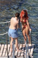 RITA ORA in Red Bikini at a Beach in Tuscany 06/05/2018