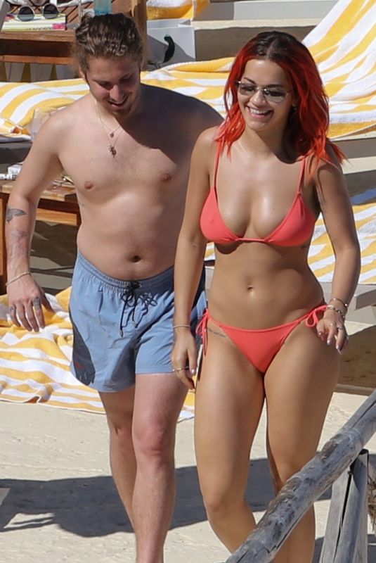 RITA ORA in Red Bikini at a Beach in Tuscany 06/05/2018