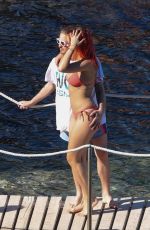 RITA ORA in Red Bikini at a Beach in Tuscany 06/05/2018