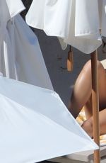 RITA ORA in Red Bikini at a Beach in Tuscany 06/05/2018