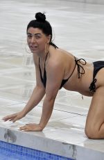 SIMONE REED in Bikini at a Pool in Alicante 06/13/2018