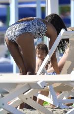 ZOE SALDANA in Swimsuit at a Beach in Marmi 06/26/2018