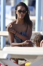 ZOE SALDANA in Swimsuit at a Beach in Marmi 06/26/2018