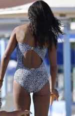 ZOE SALDANA in Swimsuit at a Beach in Marmi 06/26/2018