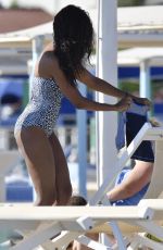 ZOE SALDANA in Swimsuit at a Beach in Marmi 06/26/2018