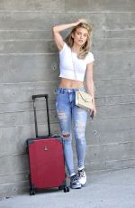 ANNALYNNE MCCORD in Ripped Jeans at LAX Airport in Los Angeles 07/03/2018