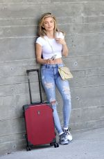 ANNALYNNE MCCORD in Ripped Jeans at LAX Airport in Los Angeles 07/03/2018