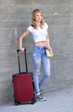 ANNALYNNE MCCORD in Ripped Jeans at LAX Airport in Los Angeles 07/03/2018