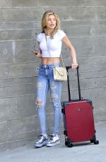 ANNALYNNE MCCORD in Ripped Jeans at LAX Airport in Los Angeles 07/03/2018