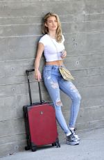 ANNALYNNE MCCORD in Ripped Jeans at LAX Airport in Los Angeles 07/03/2018