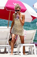 CHARLOTTE MCKINNEY at a Beach in Miami 07/16/2018