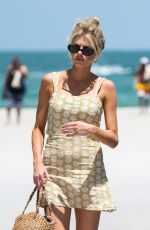 CHARLOTTE MCKINNEY at a Beach in Miami 07/16/2018