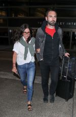 COURTENEY COX and Johnny McDaid at LAX Airport in Los Angeles 07/27/2018