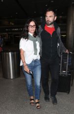 COURTENEY COX and Johnny McDaid at LAX Airport in Los Angeles 07/27/2018