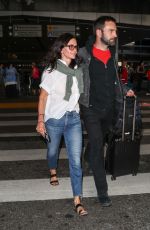 COURTENEY COX and Johnny McDaid at LAX Airport in Los Angeles 07/27/2018