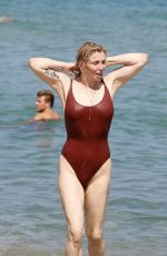 COURTNEY LOVE in Swimsuit at Club 55 in St Tropez 07/26/2018