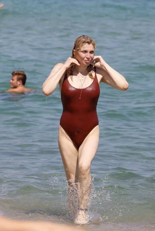 COURTNEY LOVE in Swimsuit at Club 55 in St Tropez 07/26/2018