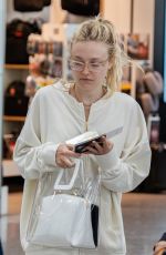 DAKOTA FANNING at Heathrow Airport in London 07/16/2018