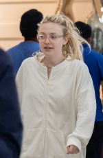 DAKOTA FANNING at Heathrow Airport in London 07/16/2018