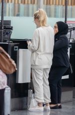 DAKOTA FANNING at Heathrow Airport in London 07/16/2018