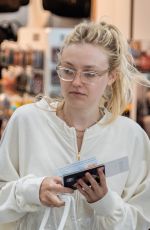 DAKOTA FANNING at Heathrow Airport in London 07/16/2018