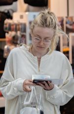 DAKOTA FANNING at Heathrow Airport in London 07/16/2018