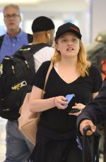 ELIZABETH MOSS at LAX Airport in Los Angeles 07/10/2018