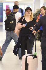 ELIZABETH MOSS at LAX Airport in Los Angeles 07/10/2018