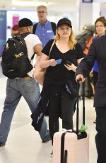 ELIZABETH MOSS at LAX Airport in Los Angeles 07/10/2018