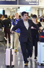 ELIZABETH MOSS at LAX Airport in Los Angeles 07/10/2018