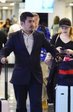 ELIZABETH MOSS at LAX Airport in Los Angeles 07/10/2018