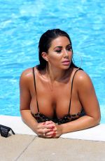 GRACE J TEAL in Swimsuit at a Pool in Southend 07/12/2018