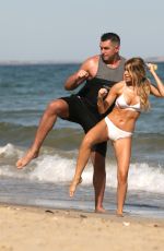 HAYLEY HUGHES in Bikini on the Beach 07/03/2018
