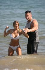 HAYLEY HUGHES in Bikini on the Beach 07/03/2018