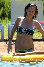 HEIDI KLUM in Bikini at a Beach in Corsica 07/25/2018
